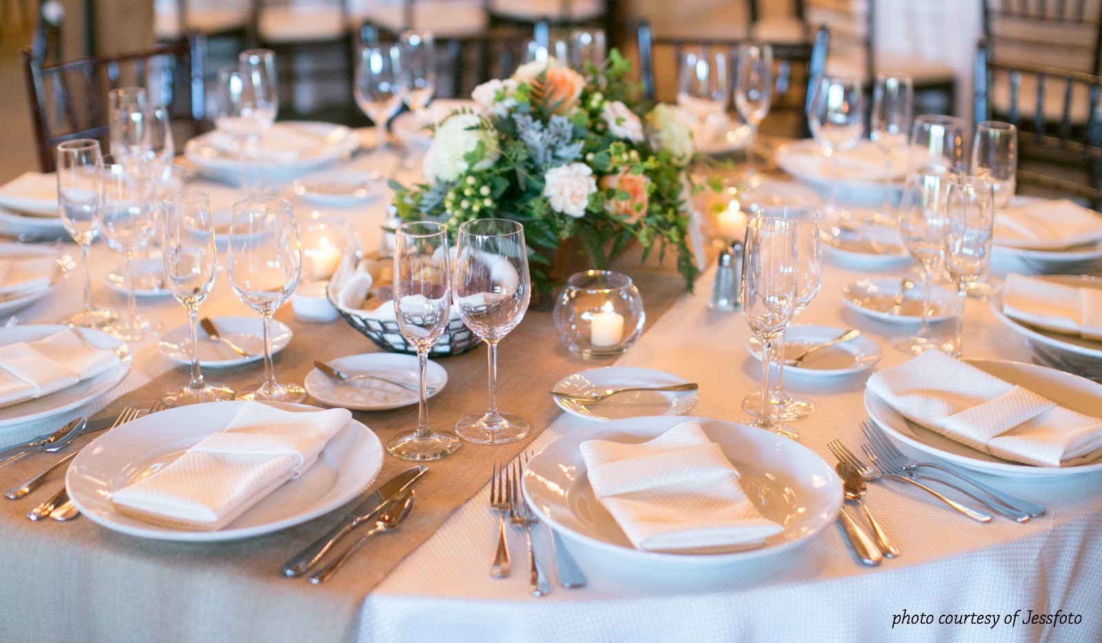 Table set for event with floral arrangement 